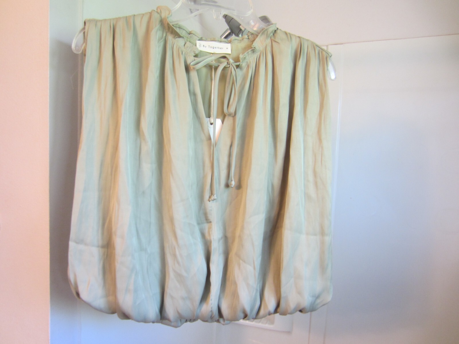 NWT women’s sleeveless blouse By Together Size M pale green satin