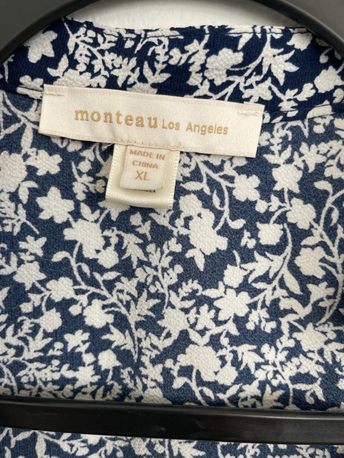 Floral blouse from Monteau Los Angeles with a wrap design and V-neck
