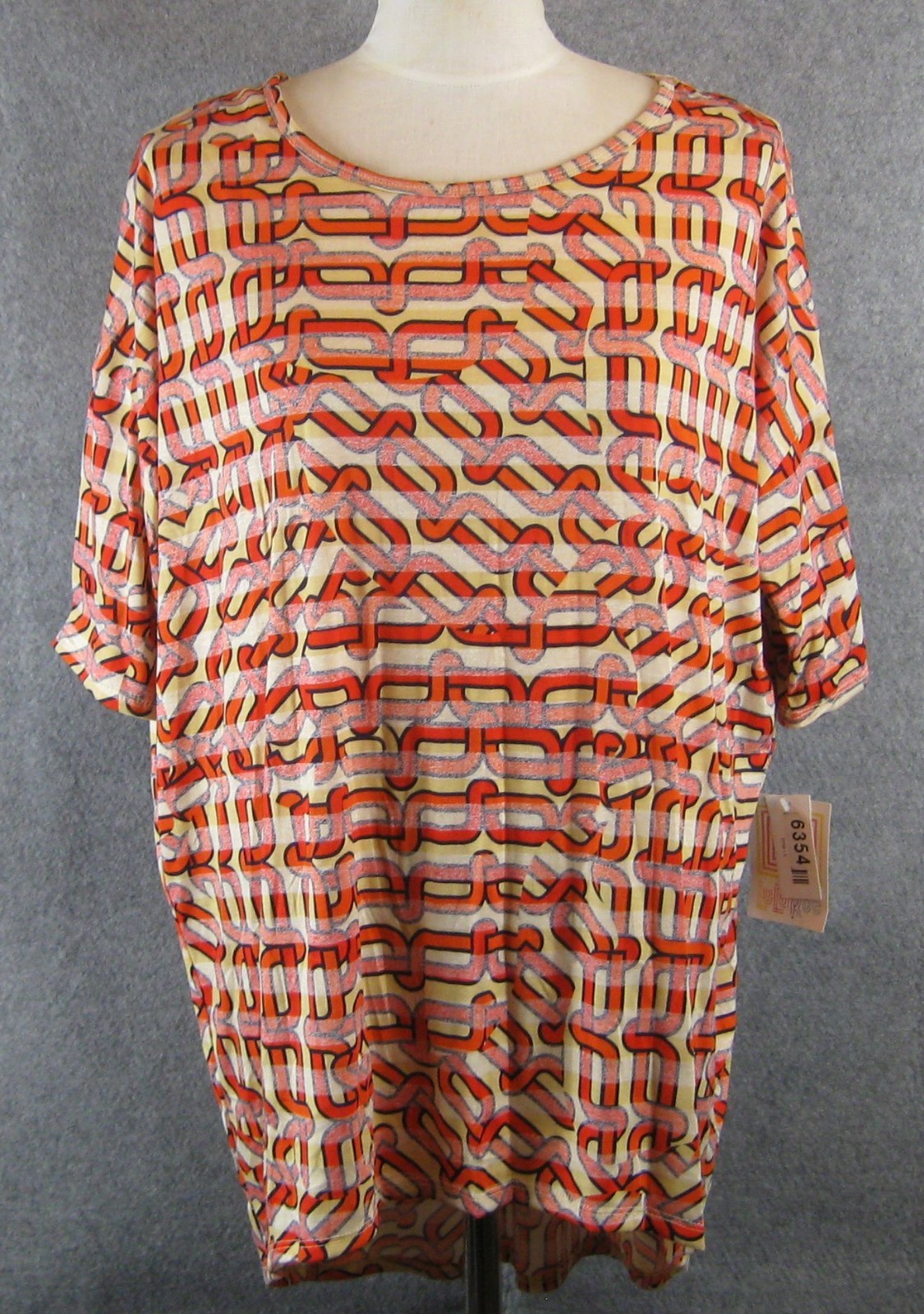 LuLaRoe Irma Tunic Top Sz L Yellow Orange Chain Print