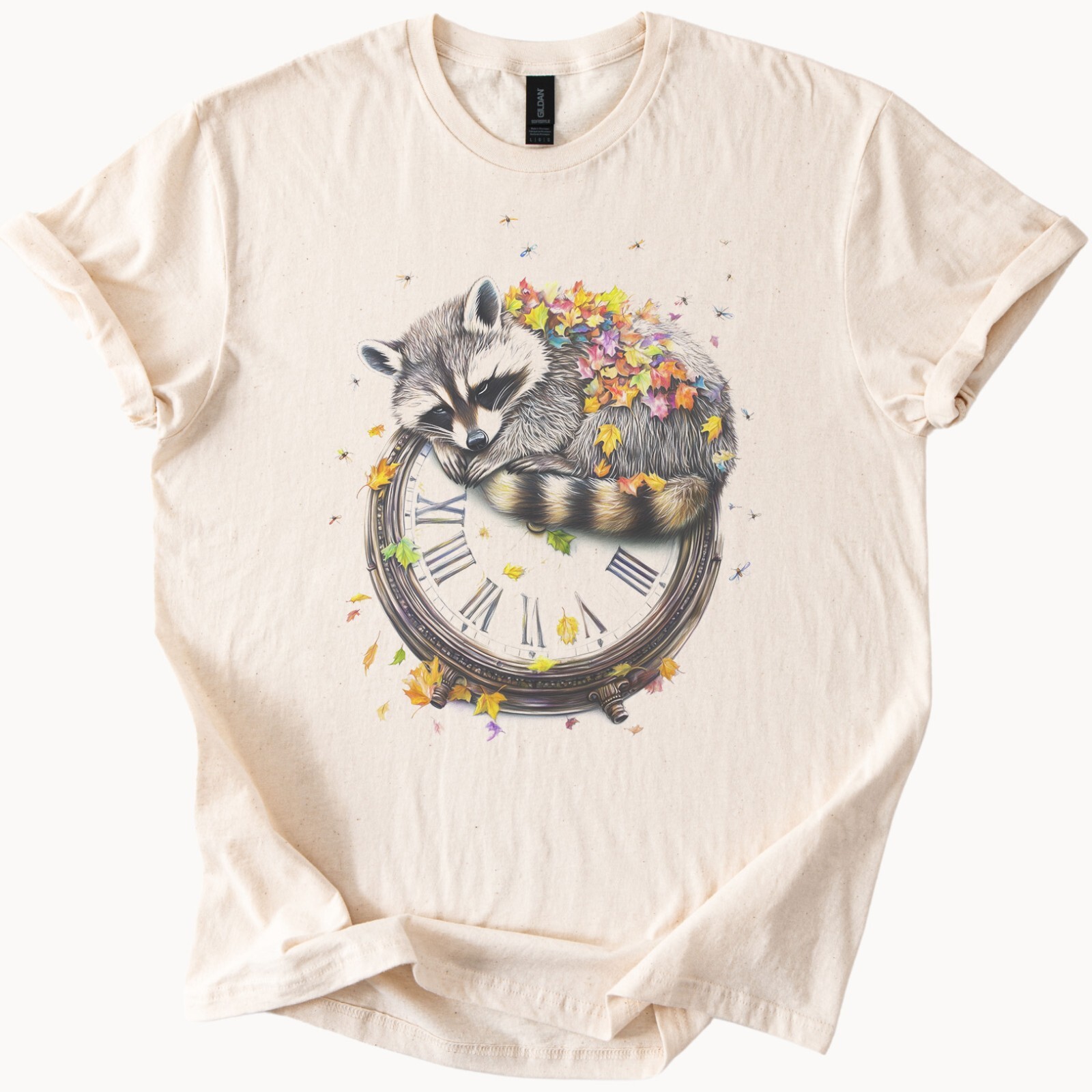 Raccoon sleeping on clock with fall leaves woodland animal graphic tee
