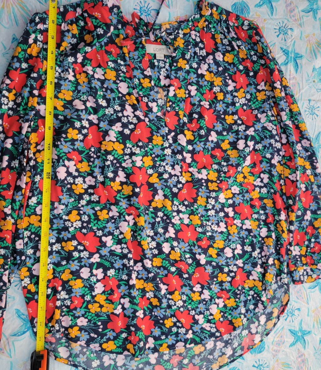 Blouse size (M) beautiful flowerery print by Loft , Fun