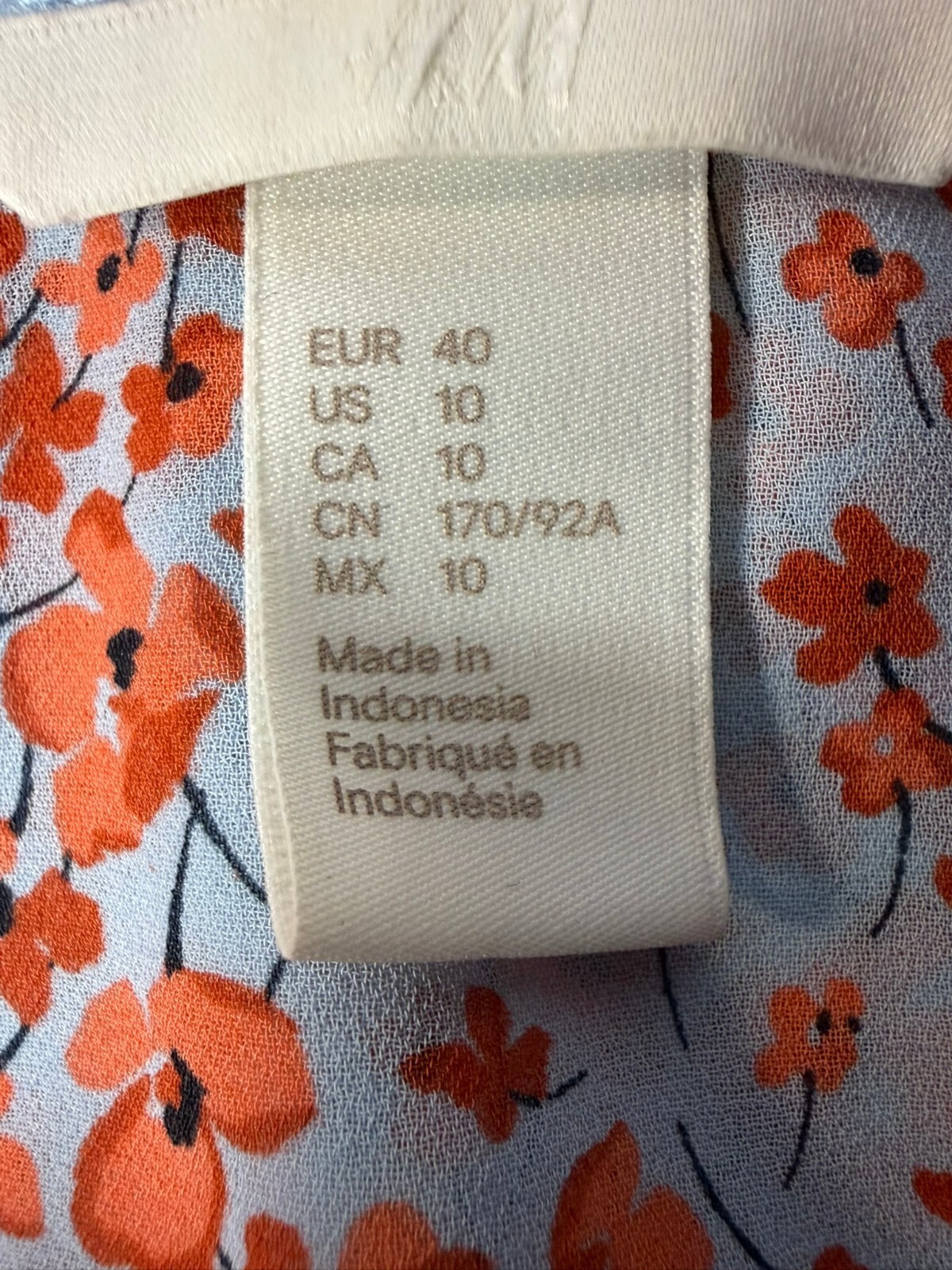 H&M Floral Sleeveless Button Front Blouse Women’s Size 10 Blue Orange