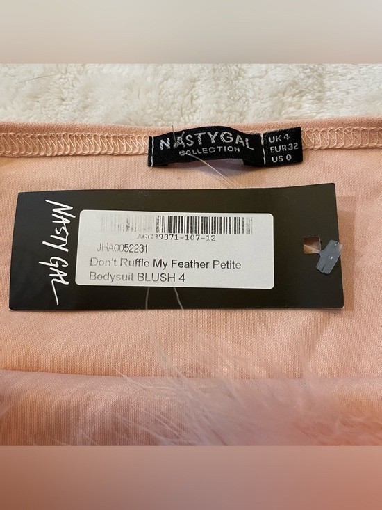 NWT Nasty Gal Blush Pink Feathered Neckline Bodysuit size US 0
