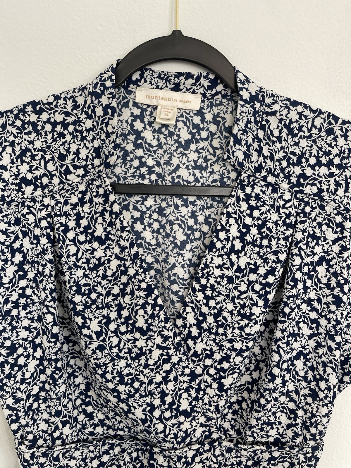 Floral blouse from Monteau Los Angeles with a wrap design and V-neck