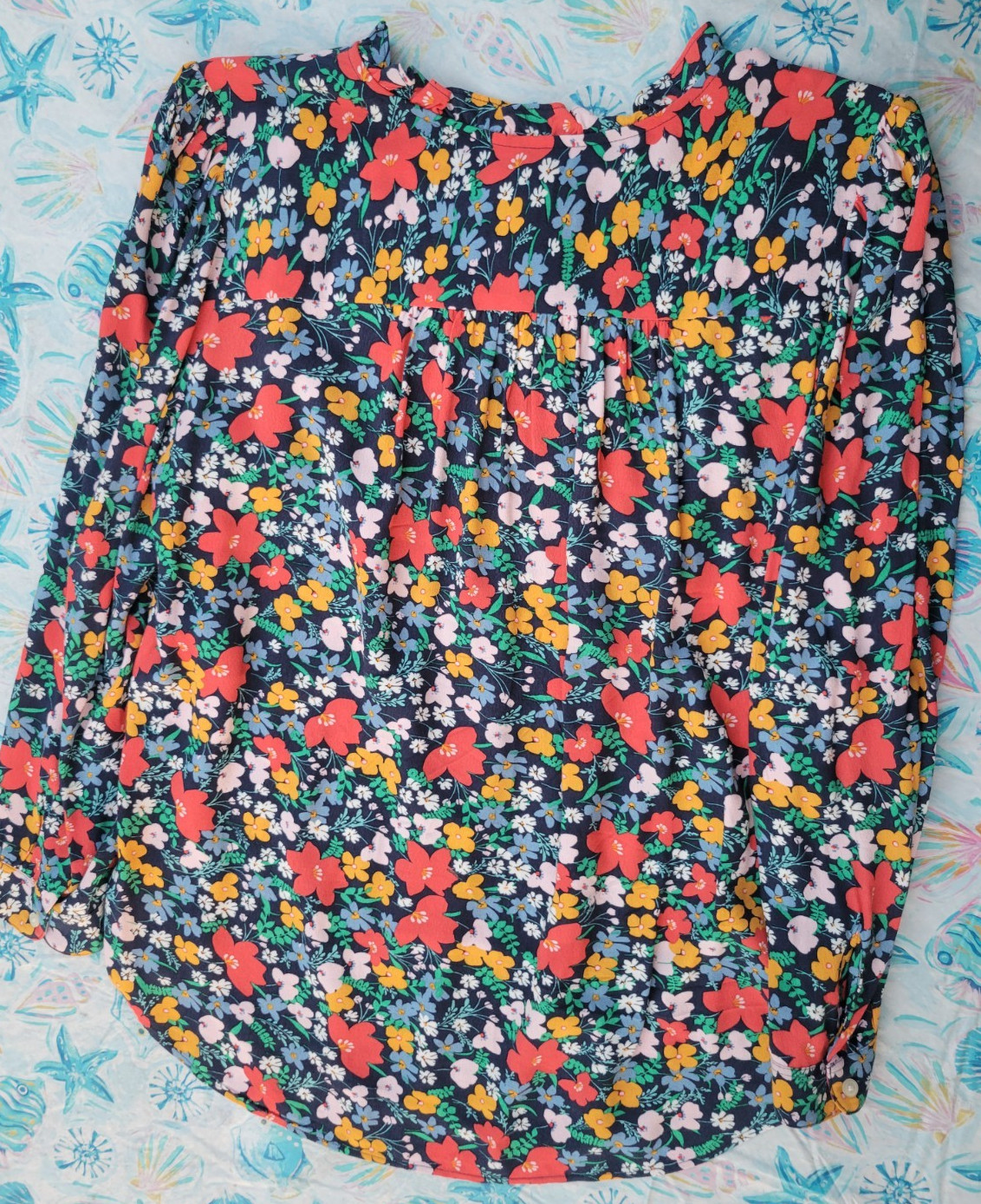 Blouse size (M) beautiful flowerery print by Loft , Fun