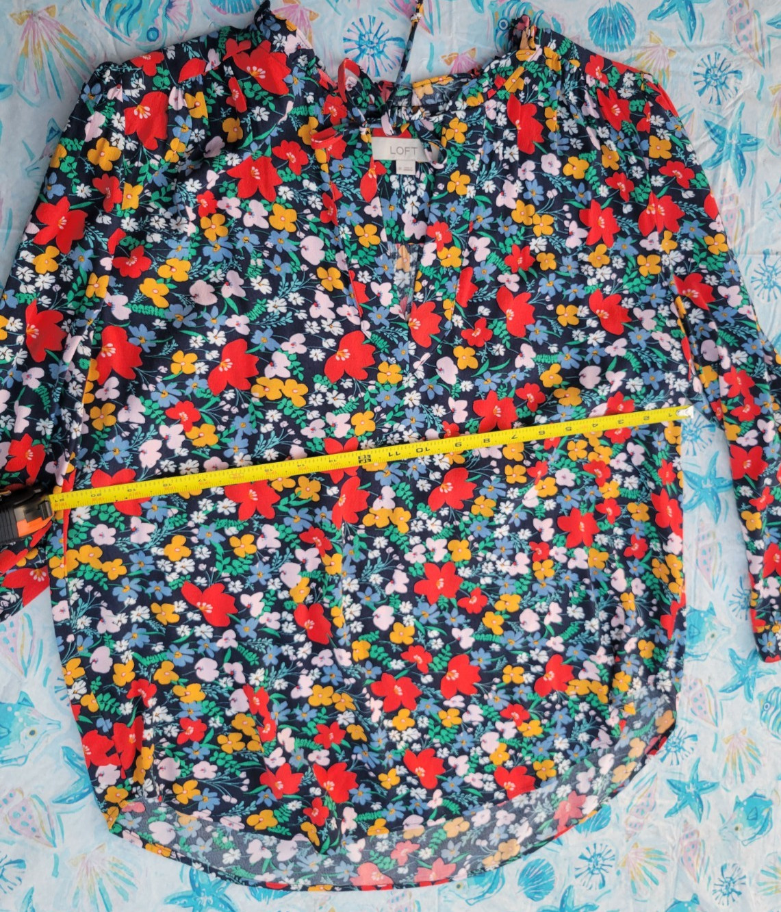 Blouse size (M) beautiful flowerery print by Loft , Fun