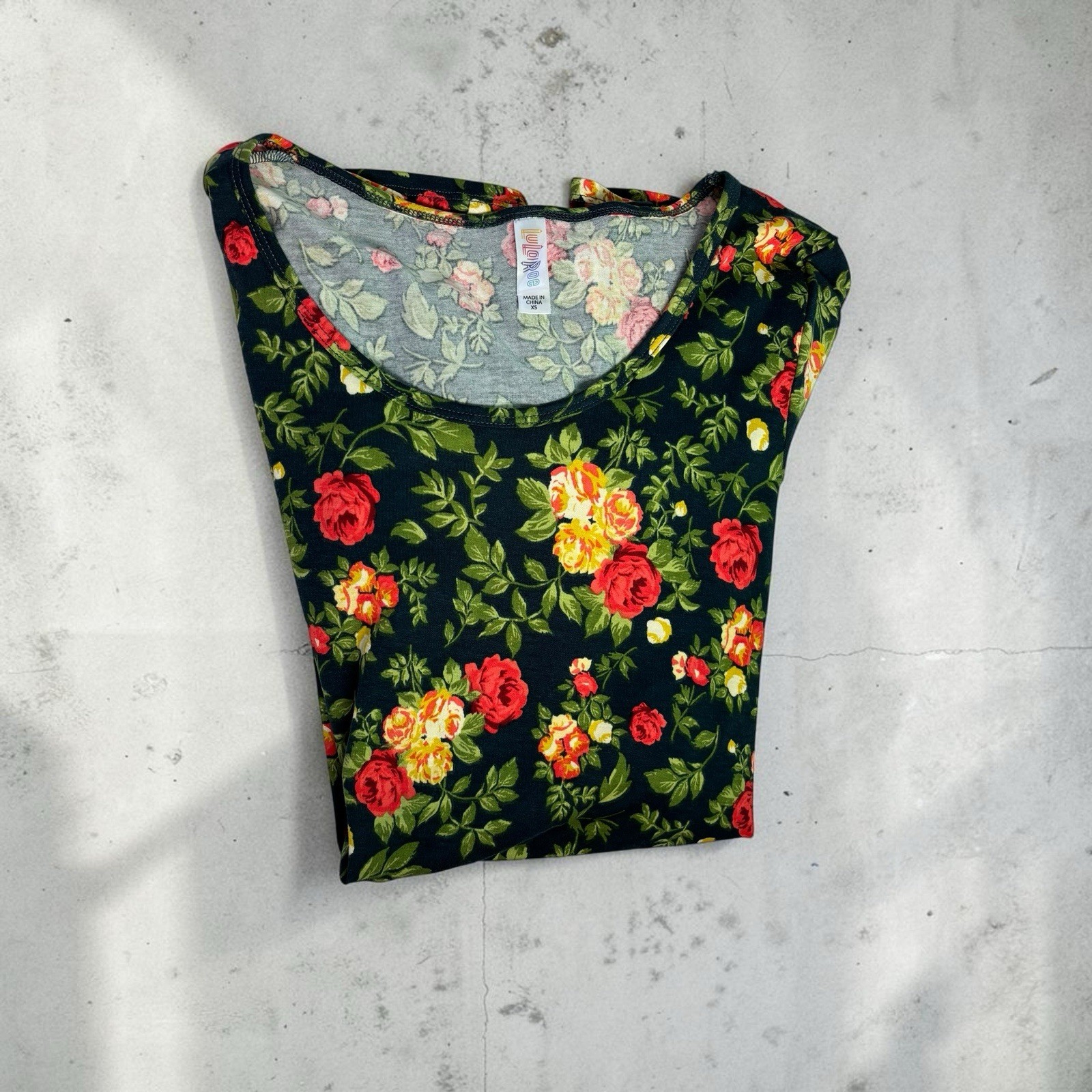LuLaRoe Perfect T Shirt Women’s Size XS Navy Blue Red Yellow Floral Swing Top
