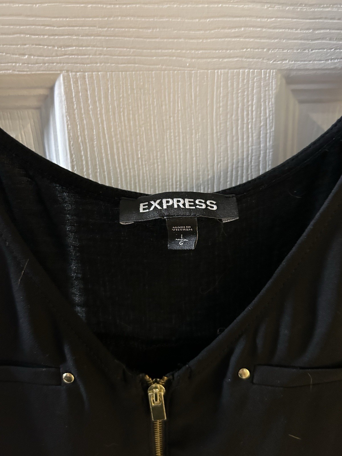 Express black sleeveless top gold half-zipper accent decorative front pockets