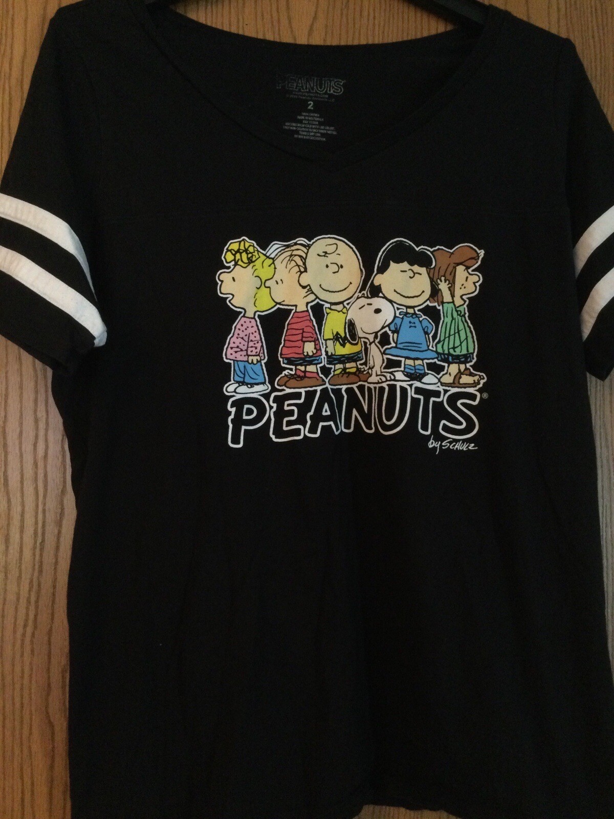 Peanuts (Group Shot) -By Schulz -Ladies Junior- 2019 Black – 2 – Striped Sleeves