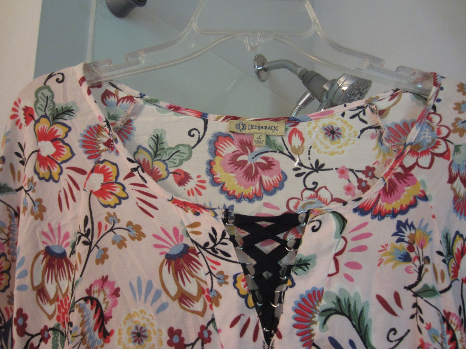 NWOT women’s short sleeved top Democracy Size L floral multi-colors