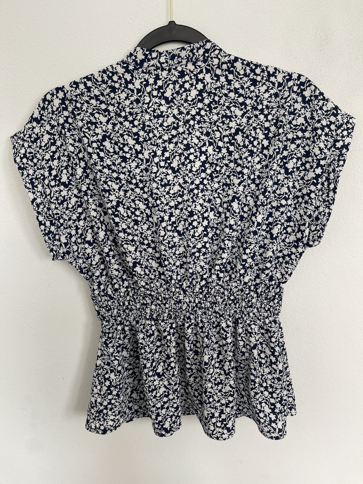 Floral blouse from Monteau Los Angeles with a wrap design and V-neck