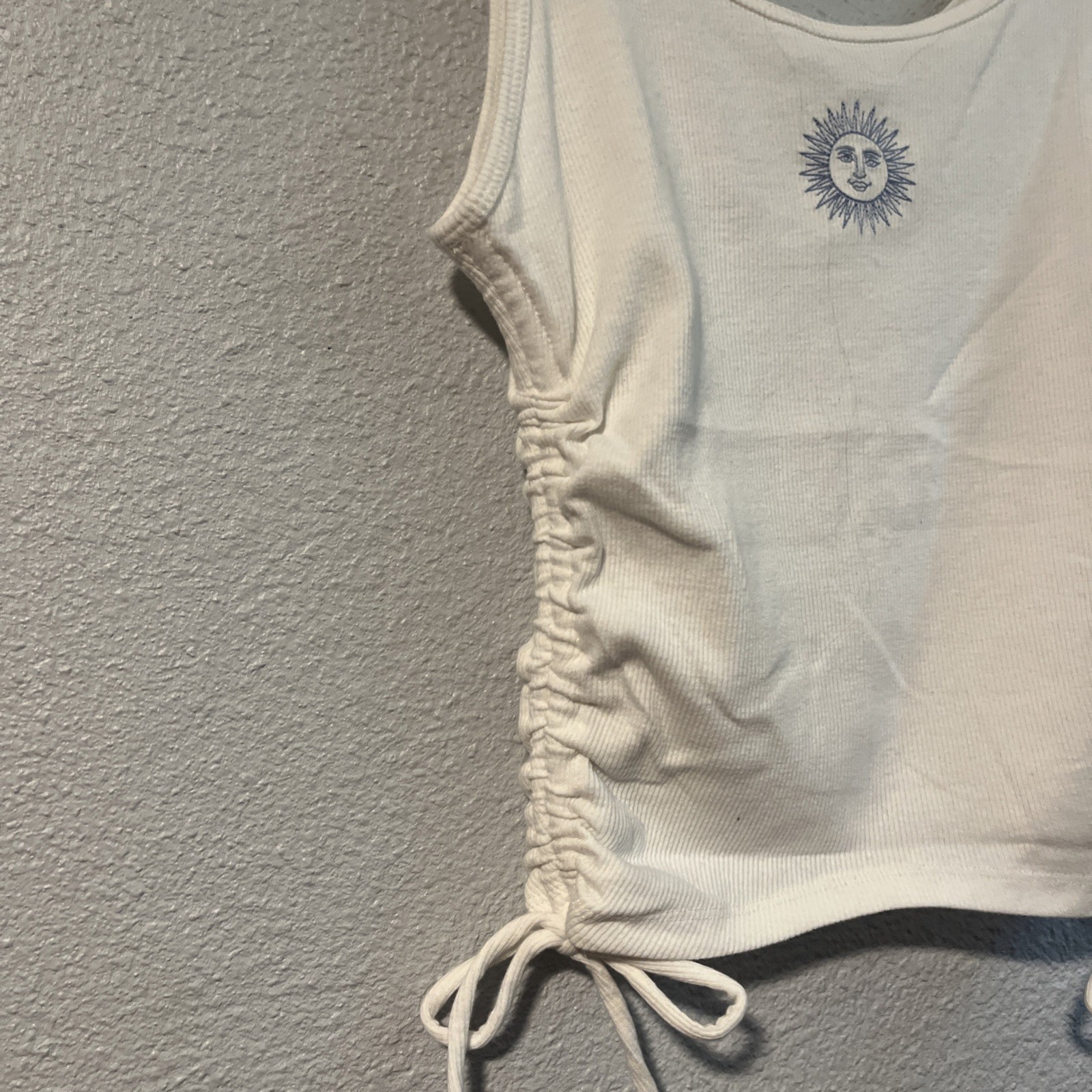 Hollister White Tank Top With Side Ties And A Blue Sun Detail Size Medium