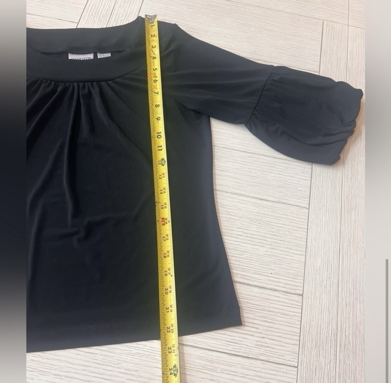 Chicos basic black top w/ bubble sleeves. Size 1/M. poly/spandex blend