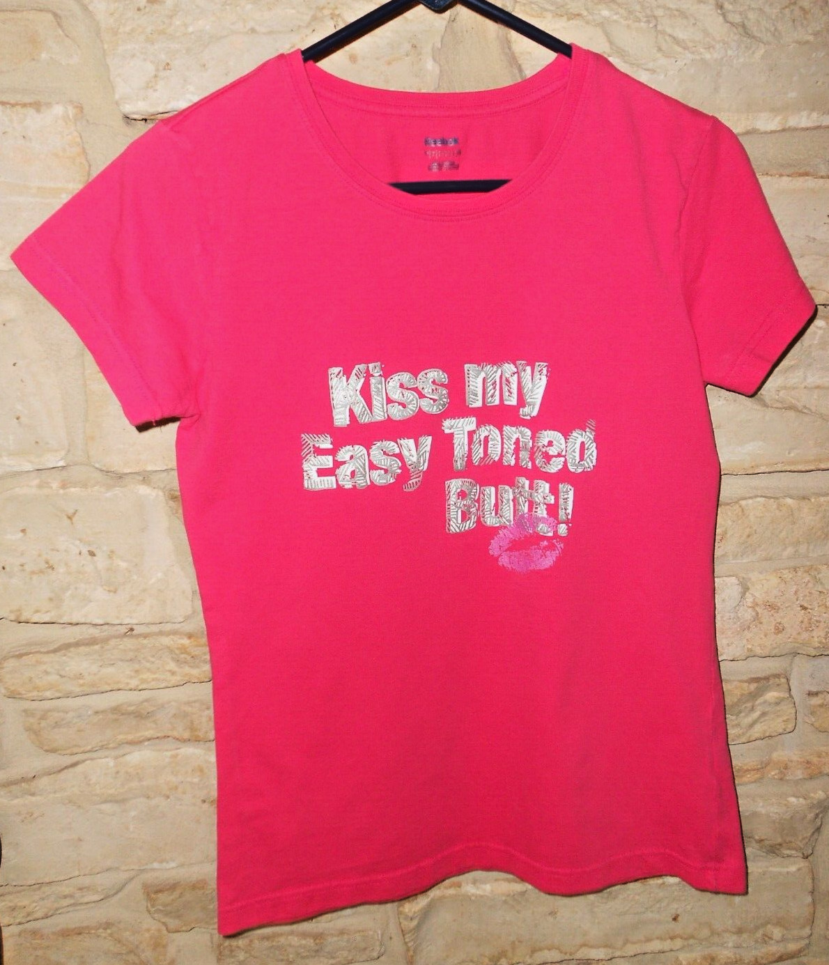 REEBOK Women’s Crew Neck T- SHIRT Sz Large “Kiss my Easy Toned Butt” Pinkish/Red