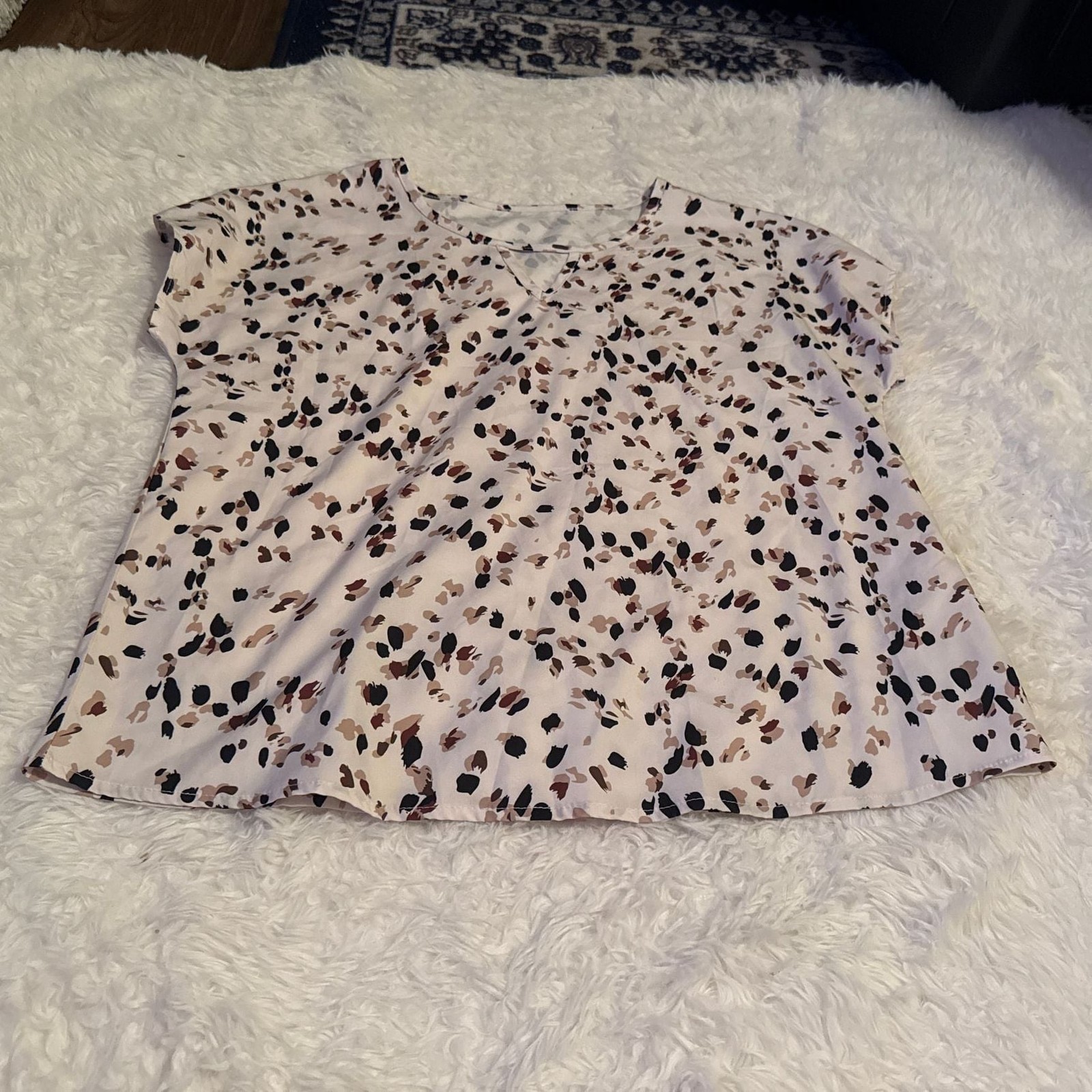 Unbranded white blouse with black, brown, and tan abstract splatters