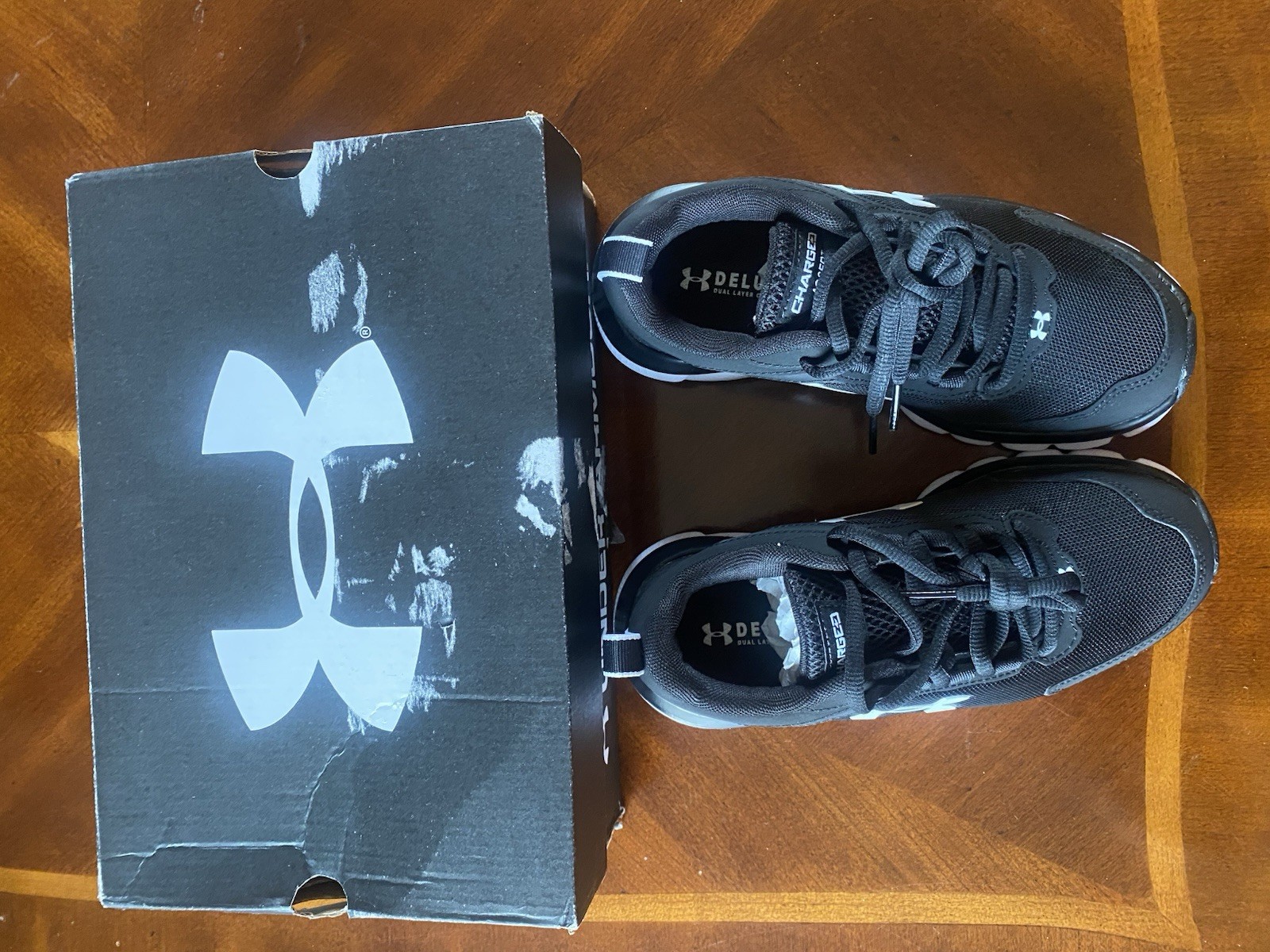 Under Armour Charged Assert 9D Low Top Lace-Up Athletic Sneakers Black/White