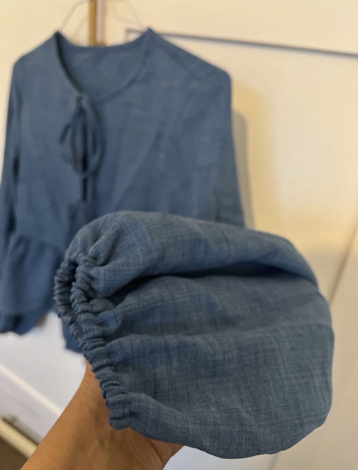blue ruffle blouse