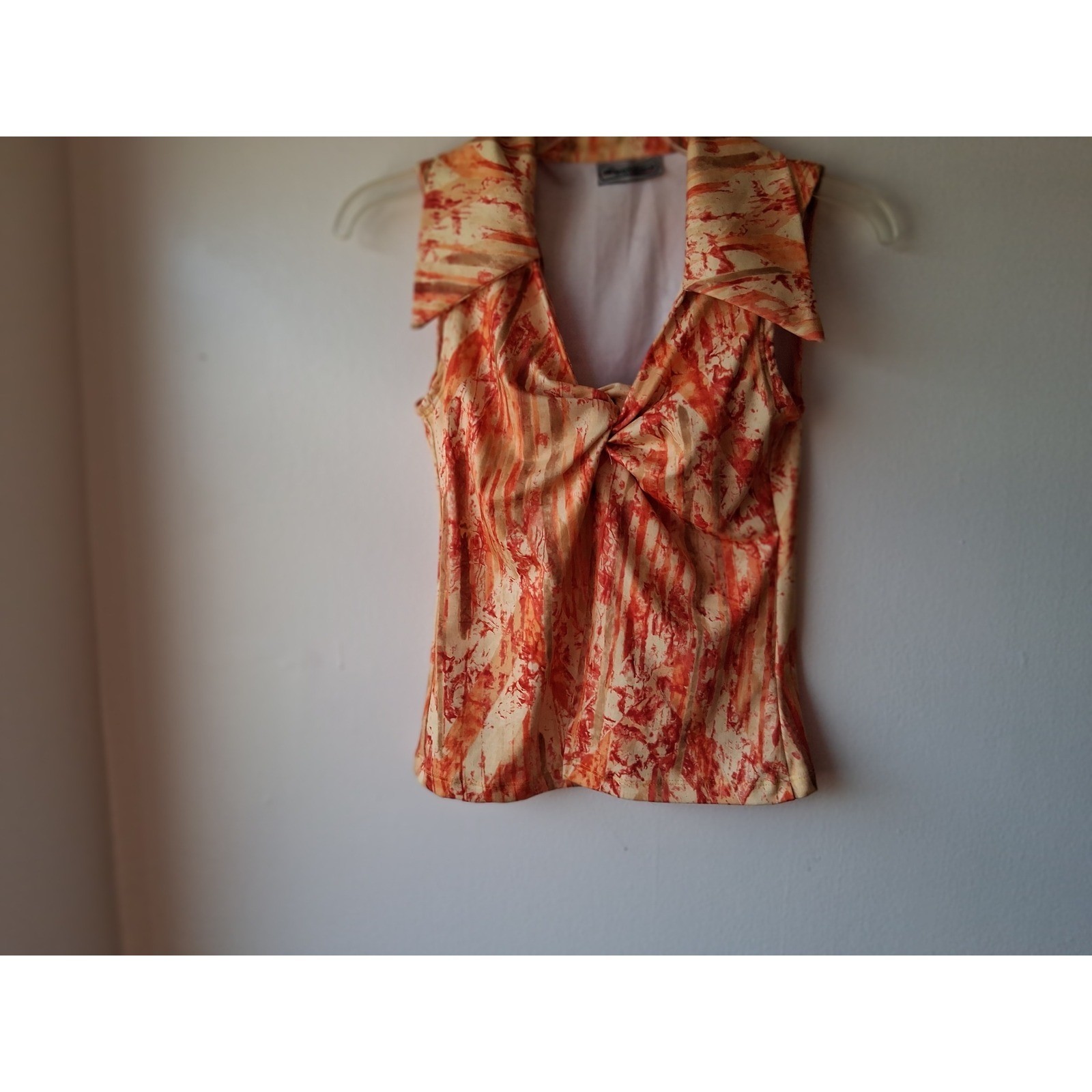 Evolution Not Revolution Womens Orange Abstract Print Twist Front Sleeveless Top