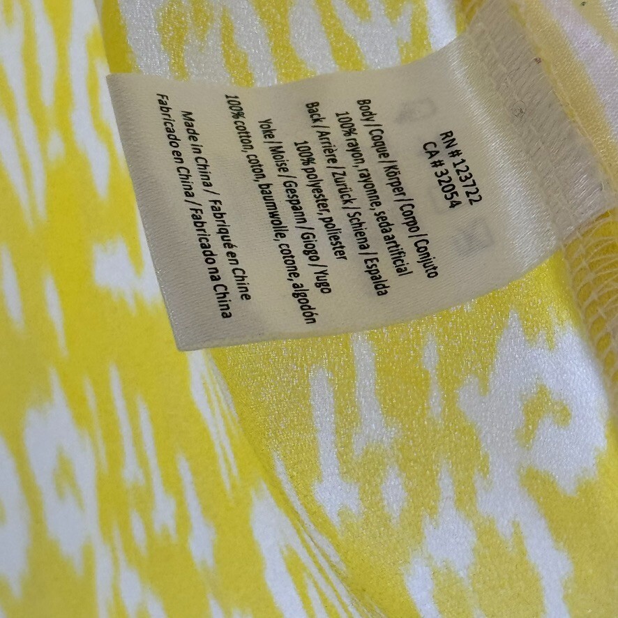 One September anthropologie women’s sleeveless blouse embroidered yellow large