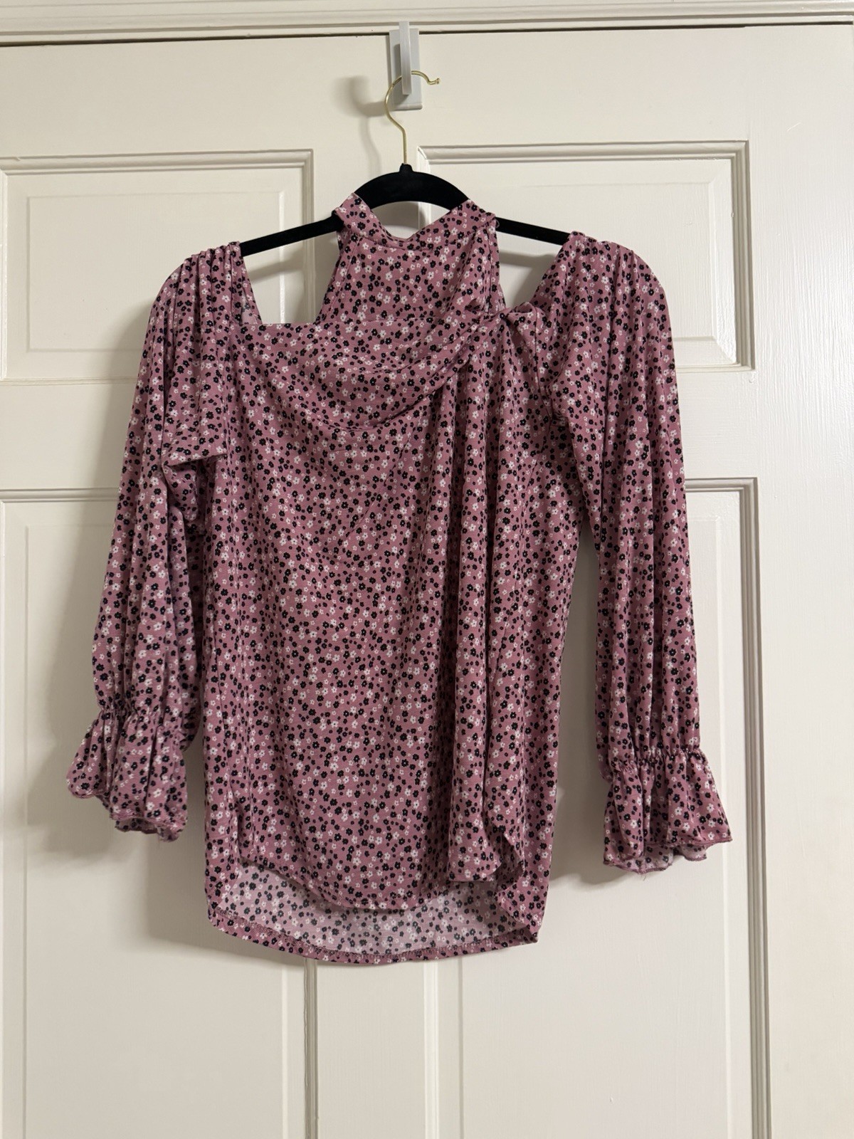 pink and black floral cold-shoulder top has a vibrant all-over flower design m