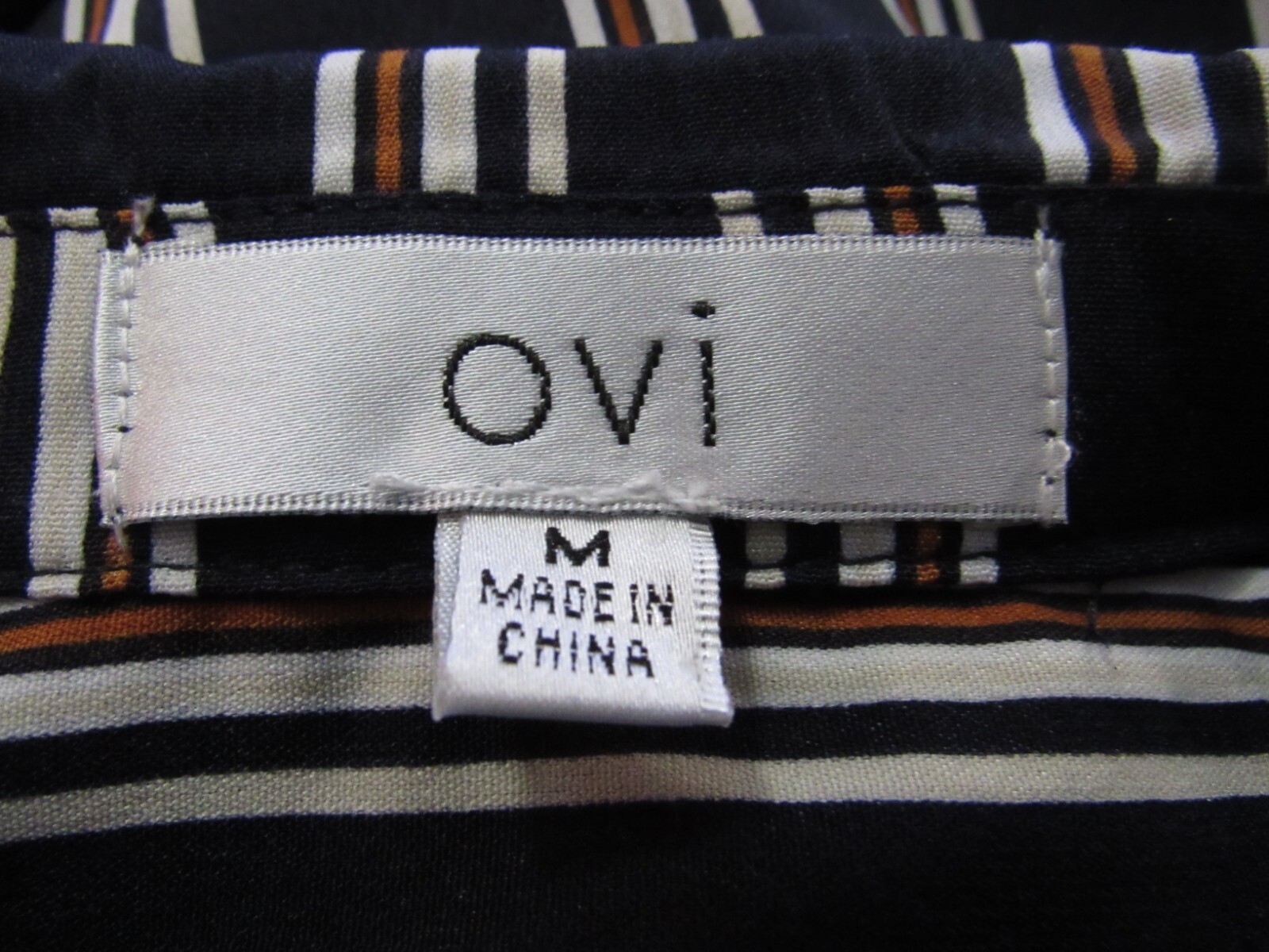 OVI women’s striped button long roll-tab sleeve shirt black white rust M