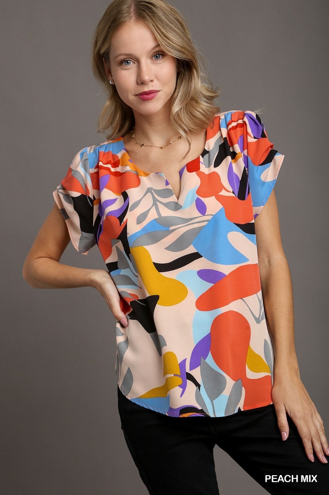 Umgee Short Sleeved Multi Abstract Print Top Split Neckline Rounded High Low Hem