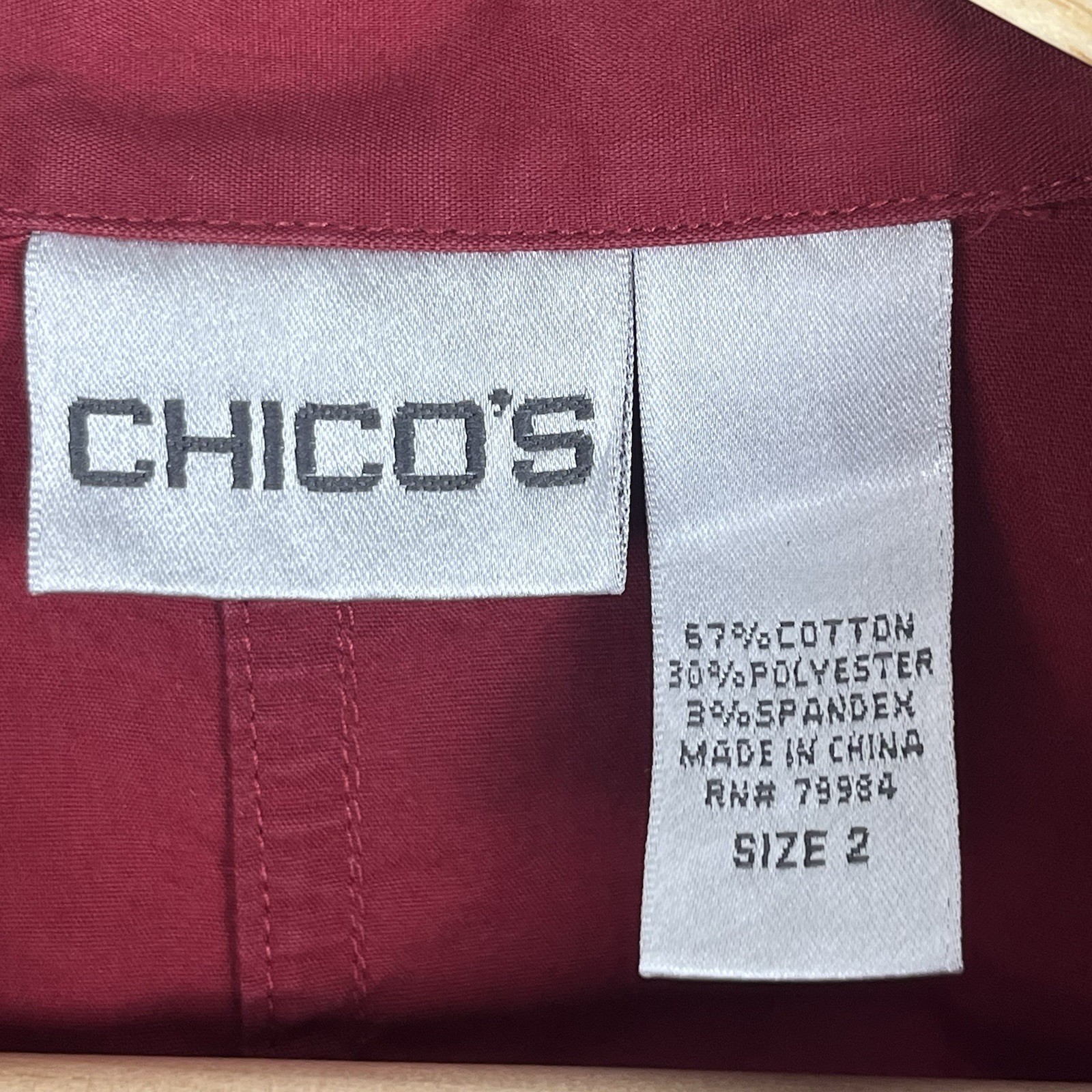 Chico’s red poly cotton spandex button front tunic length shirt, large.