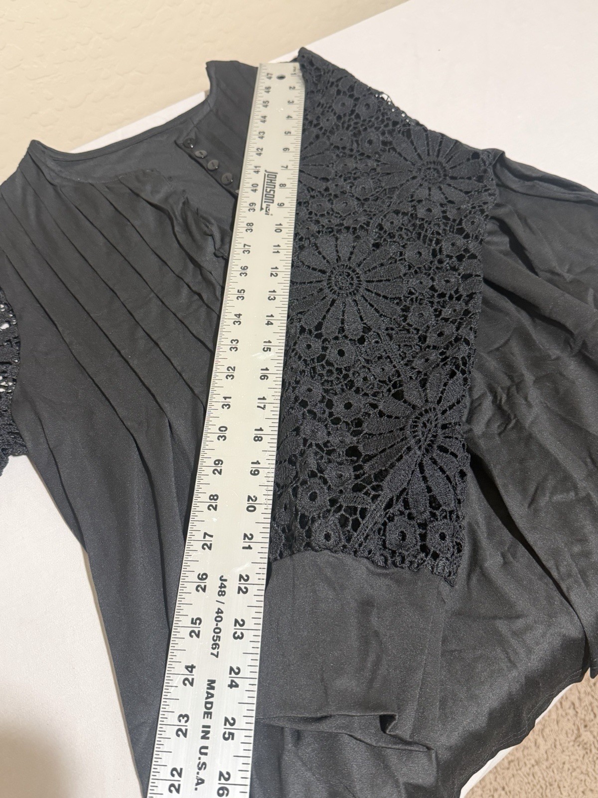 Black polyester & spandex blouse with lace sleeves and button-up front size 2XL