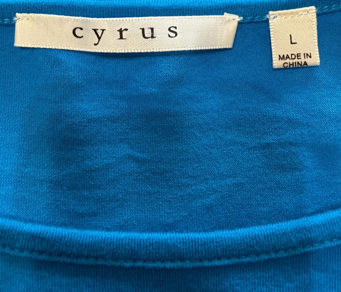 Cyrus ladies size L blouse with studded sleeves.