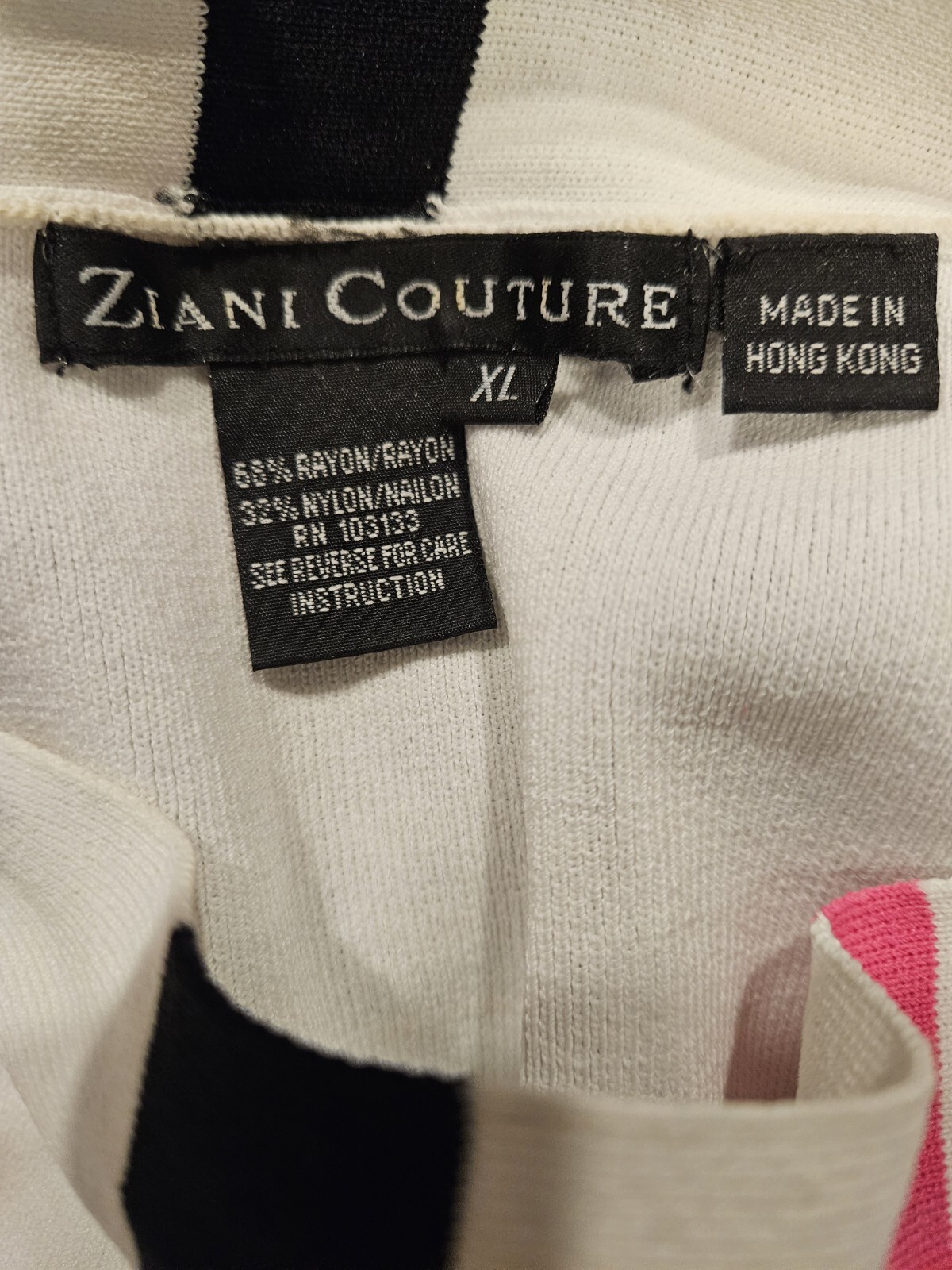 Fine Gauge Ziani Couture Knit Long Sleeve Top with pink and black accents