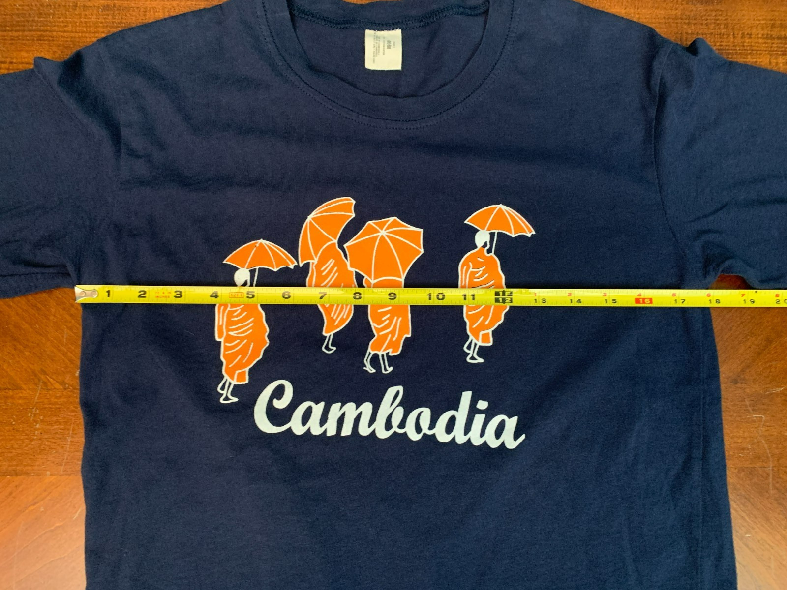 Cambodia Monks with Umbrellas Women’s T-Shirt – Size Medium, Blue & Orange