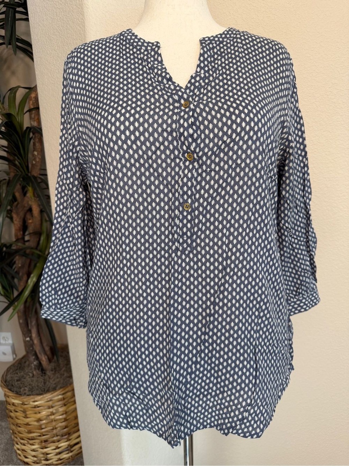 Steel blue tunic with an allover white geometric print
