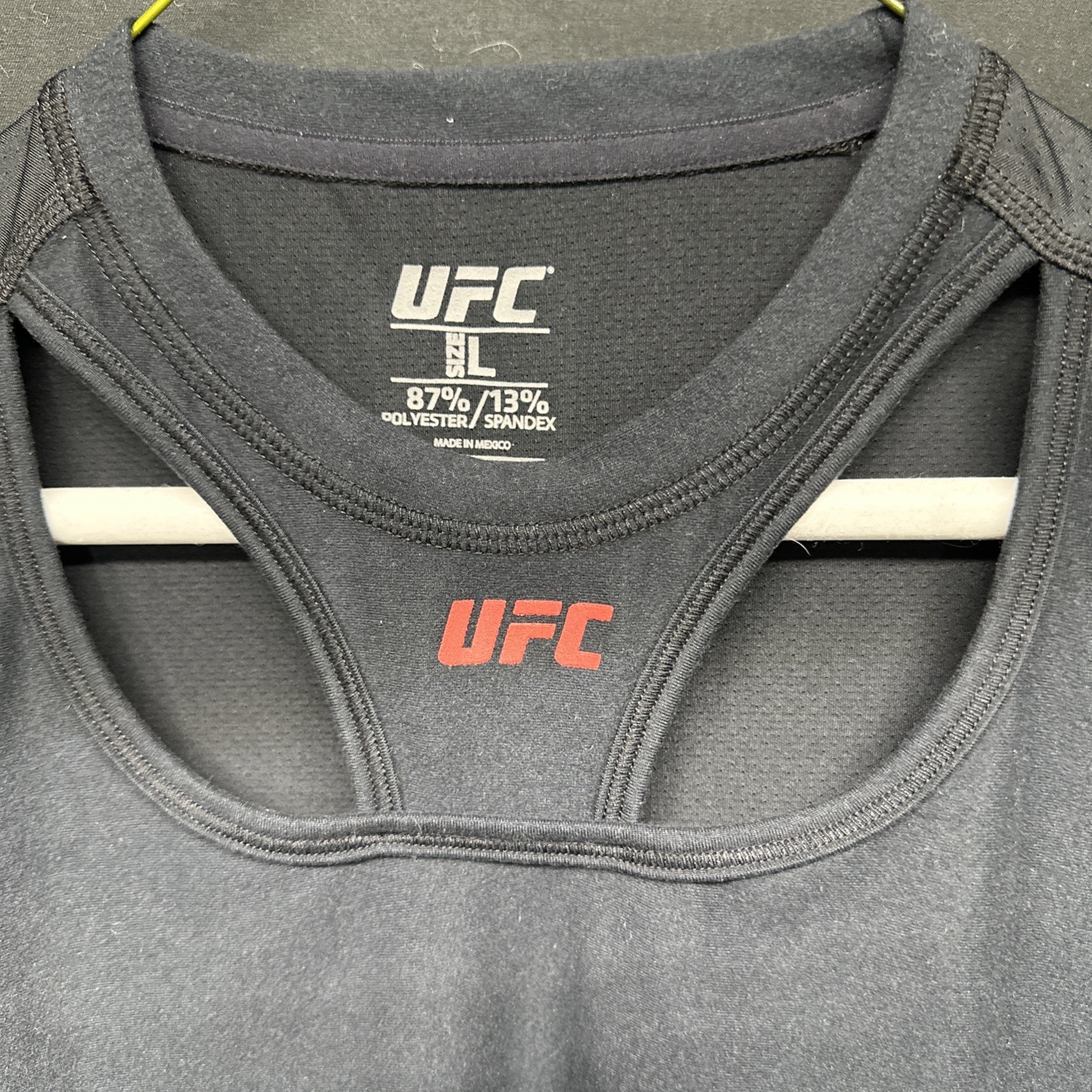 UFC Sleeveless Cutout Workout Top For Woman- Blended Fabric Size Large