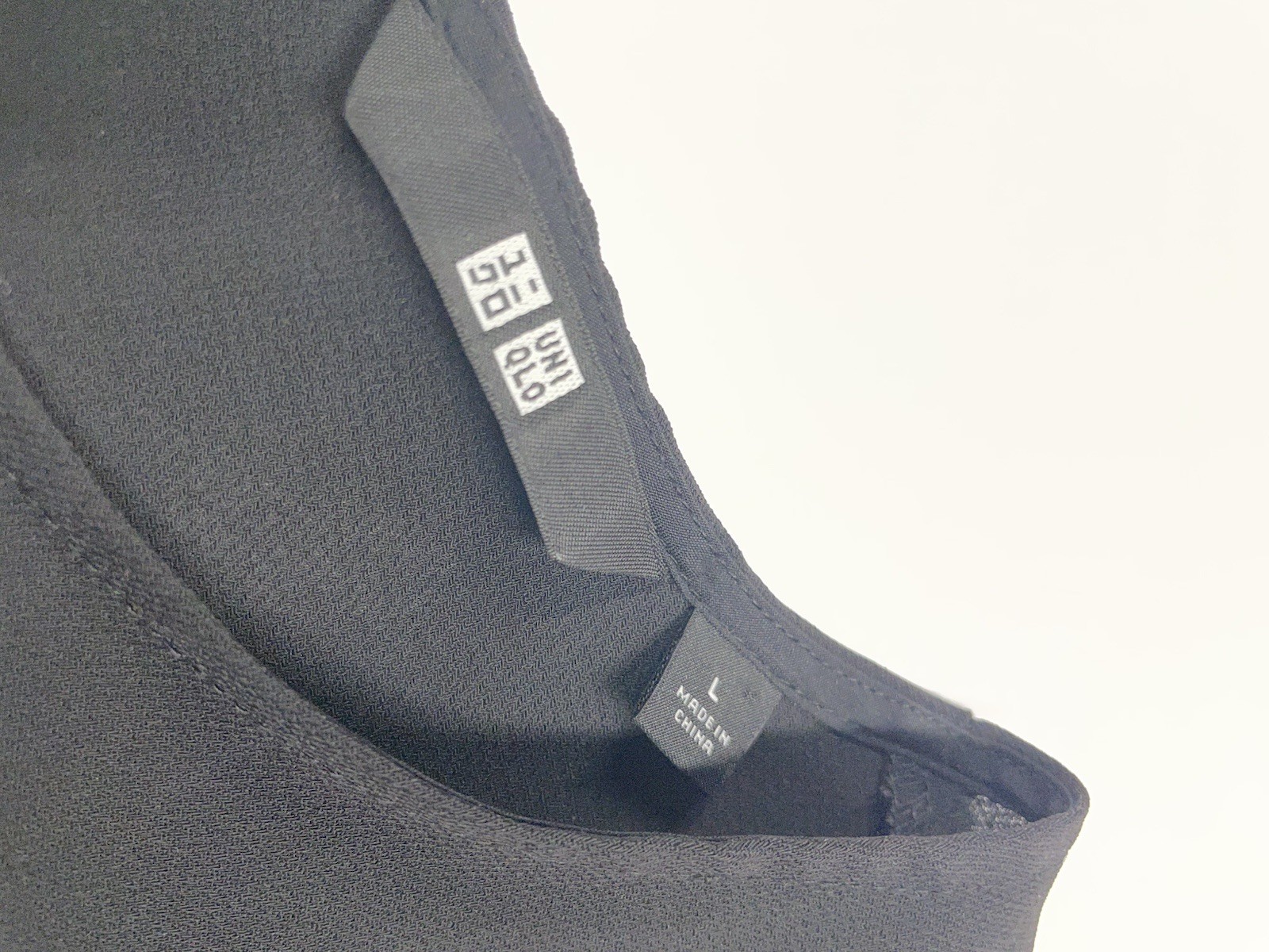 UNI OLO Black Box cut Minimalist Blouse with shirt tail hem – Large