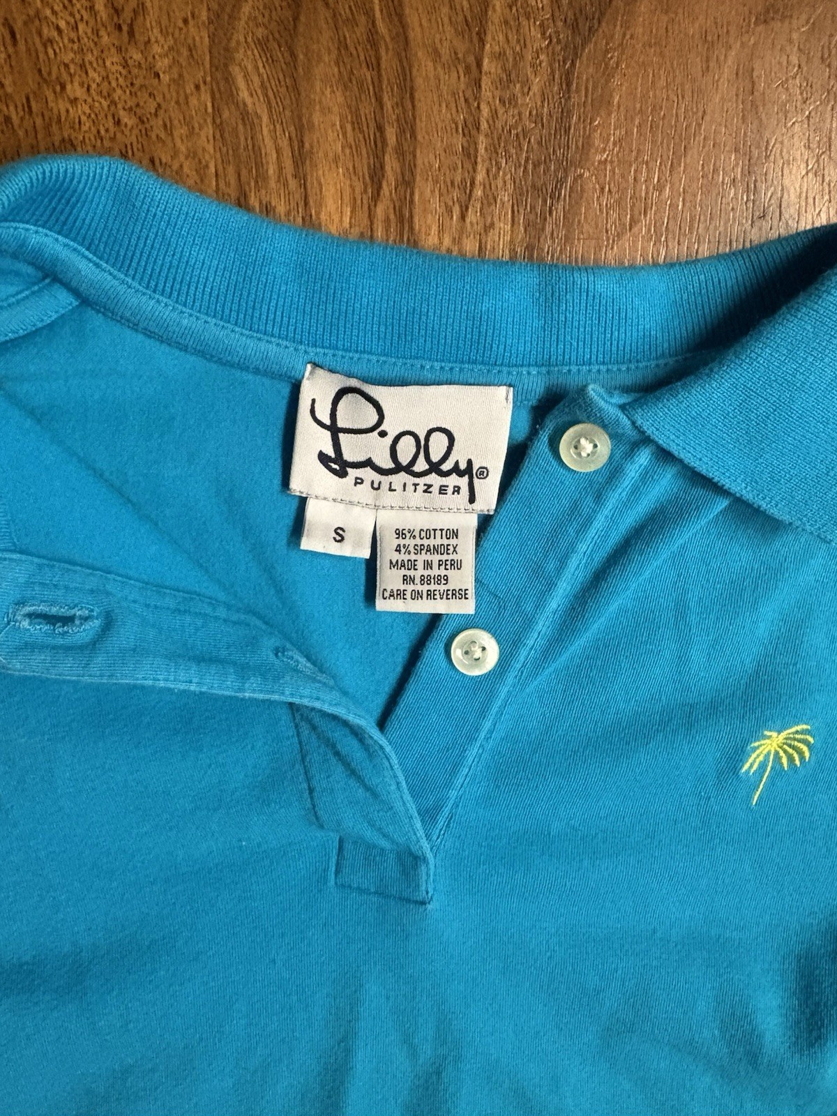 Lilly Pulitzer Size S Blue Solid Collared Stretch Knit Short Sleeve Polo Shirt