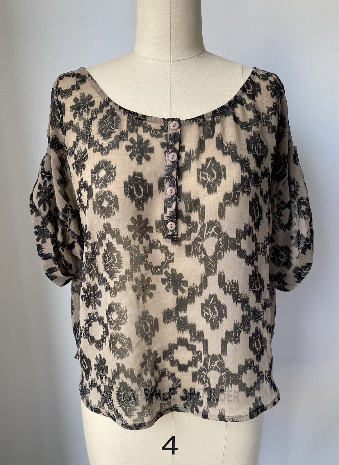 imaginary voyage Tan & Black Geometric Ikat Sheer Henley Blouse Top