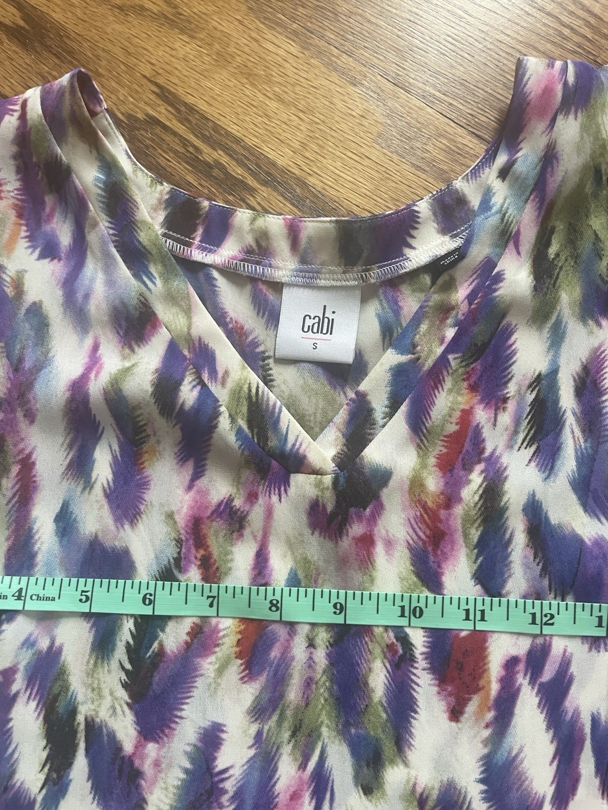CAbi Cap Sleeve Plume Feather Blouse Size Small Purple Blue Green V Neck Top