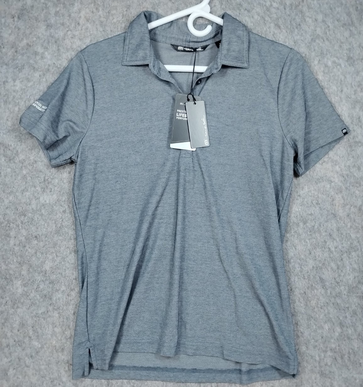 Travis Mathew Women’s M Oceanside Heather Polo Blue Nights NWT Corporate Logo