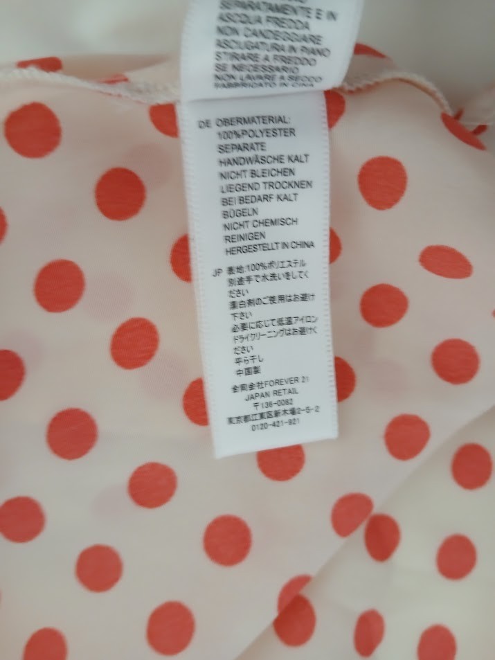 XXI white with coral poka dots sleeveless blouse