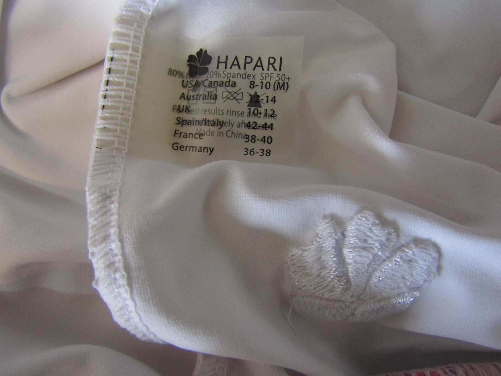 Hapari White Nylon/Spandex Banded Hem Halter Tankini Top Women’s Size 8-10 M