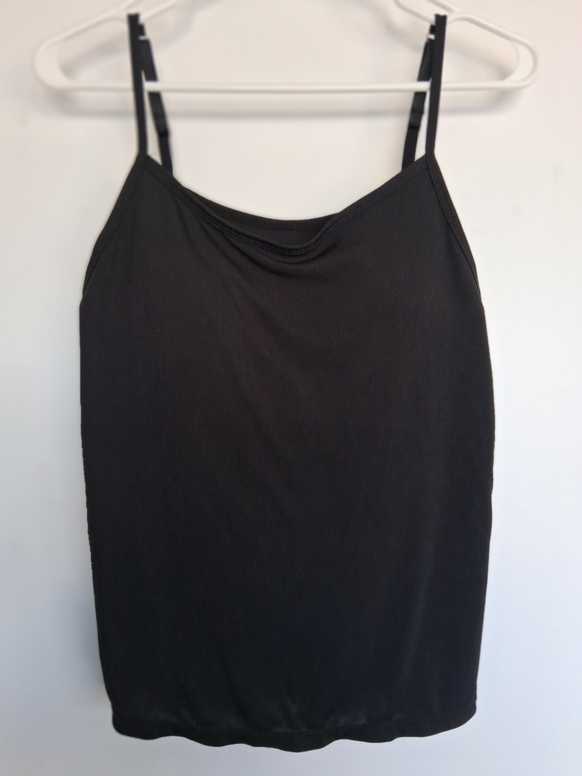 Size Small, black stretch cami w/ built in bra and adjustable straps. Excellent