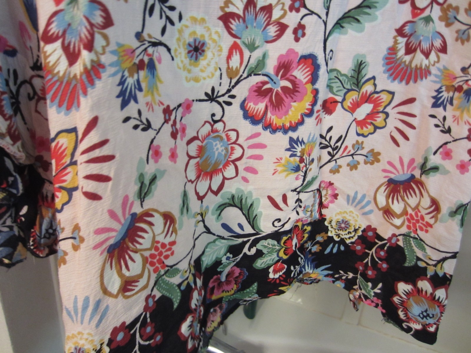 NWOT women’s short sleeved top Democracy Size L floral multi-colors