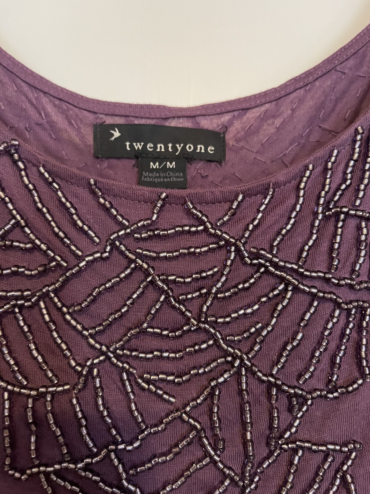 Twentyone-Purple Beaded Top Size Medium dolman style draped sleeve hip length
