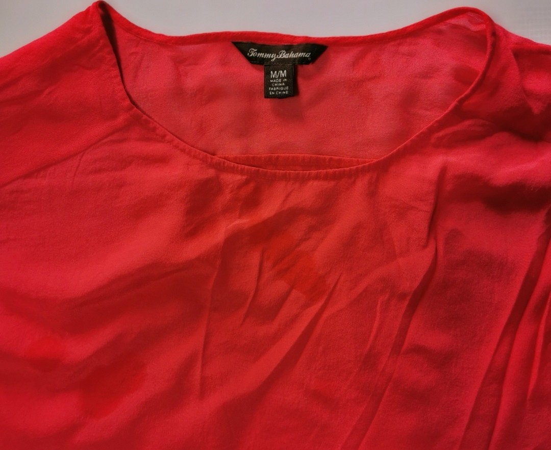 Tommy Bahama Silk Blouse. Silk blouse used in good condition 100% silk size: L