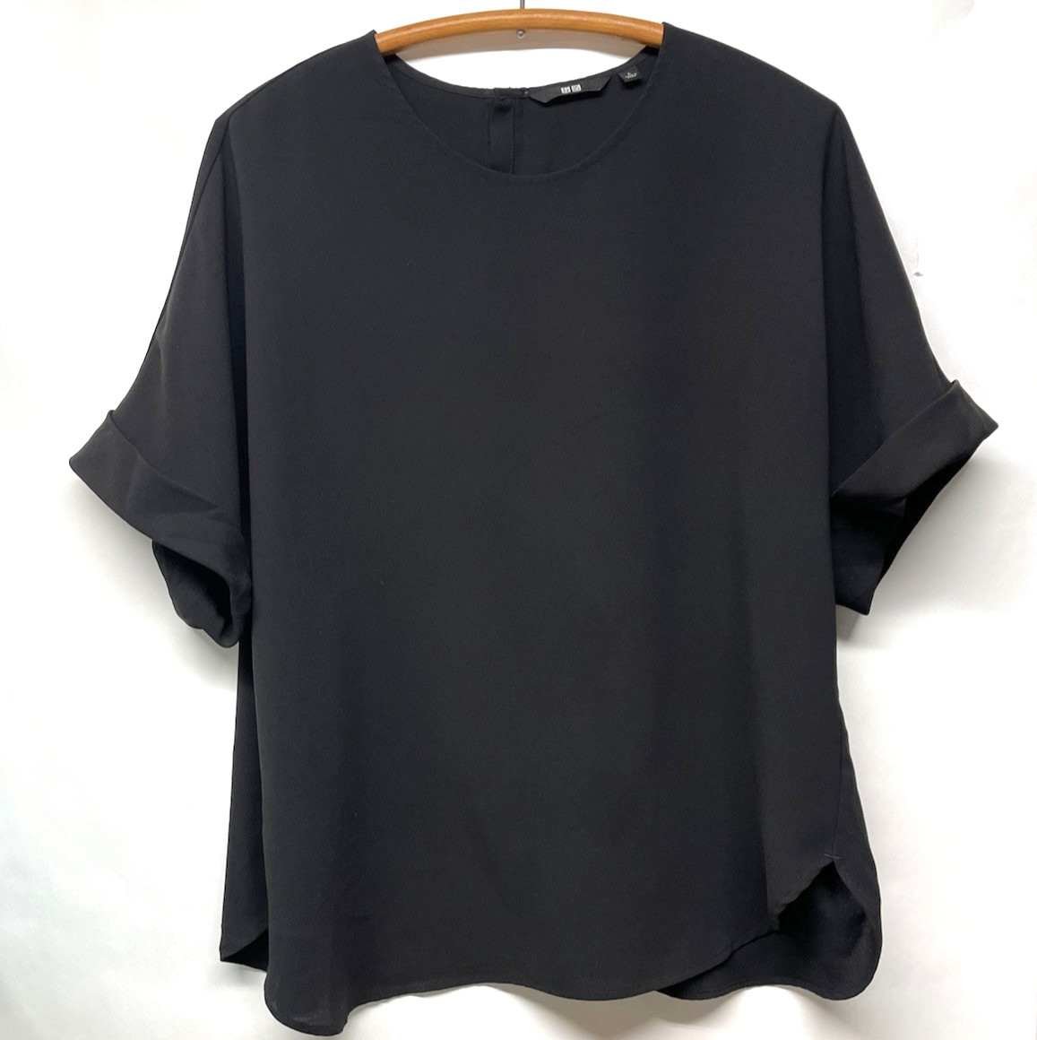 UNI OLO Black Box cut Minimalist Blouse with shirt tail hem – Large