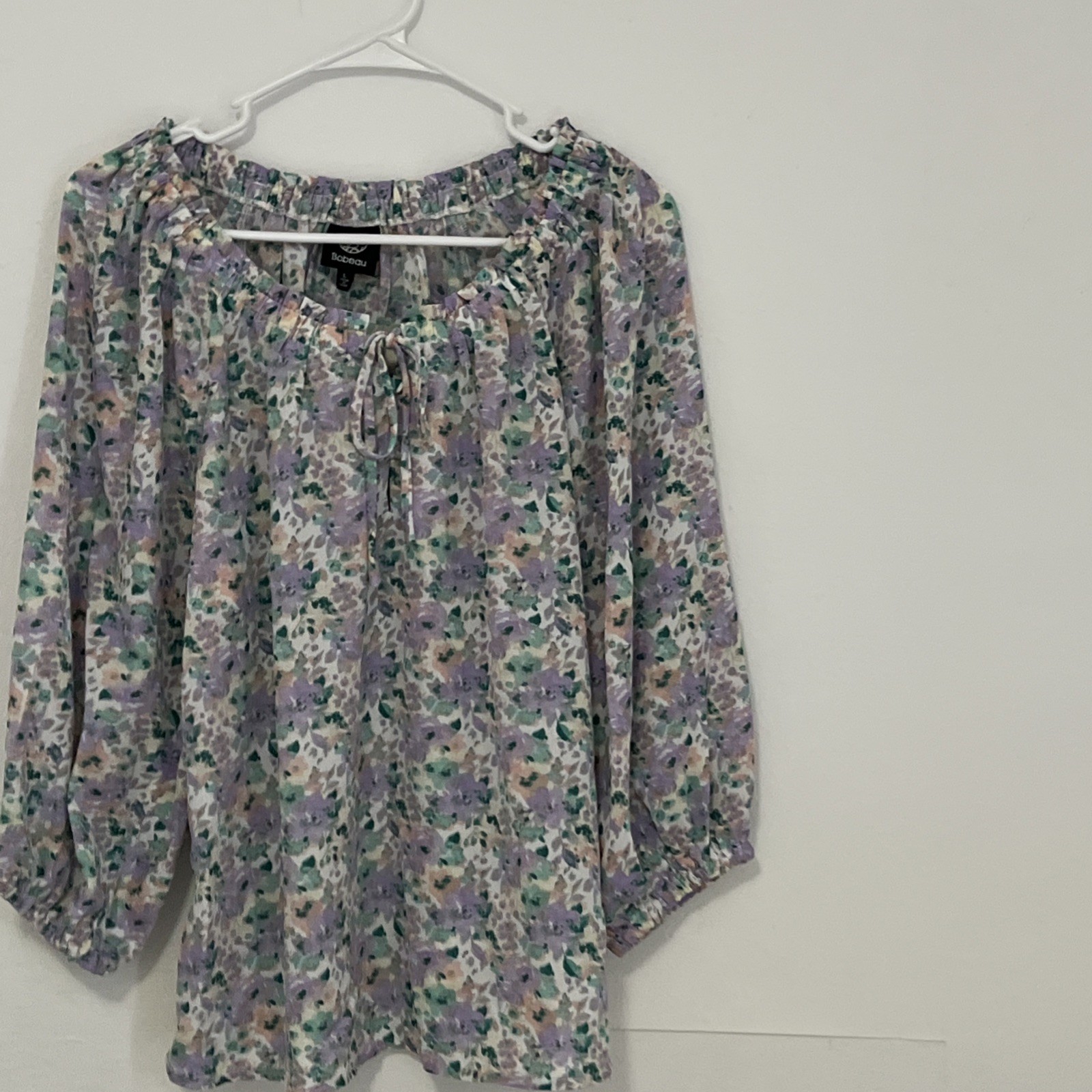Versona multi-color (pastels) lightweight. Size Large New with tags.