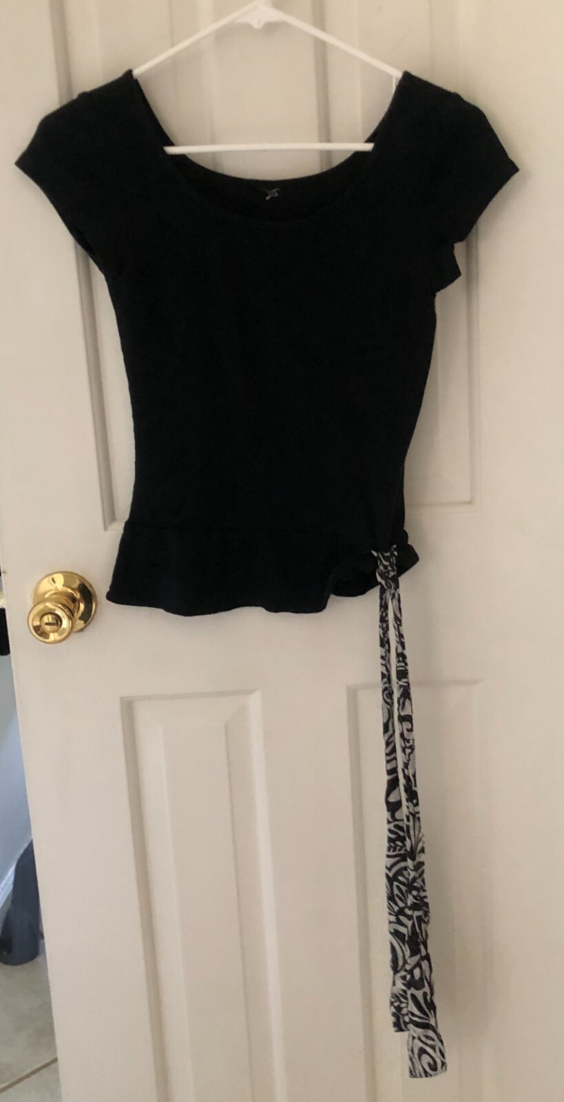 Black T Shirt with attached Black & White Geometric Bow at Hip – Size Small