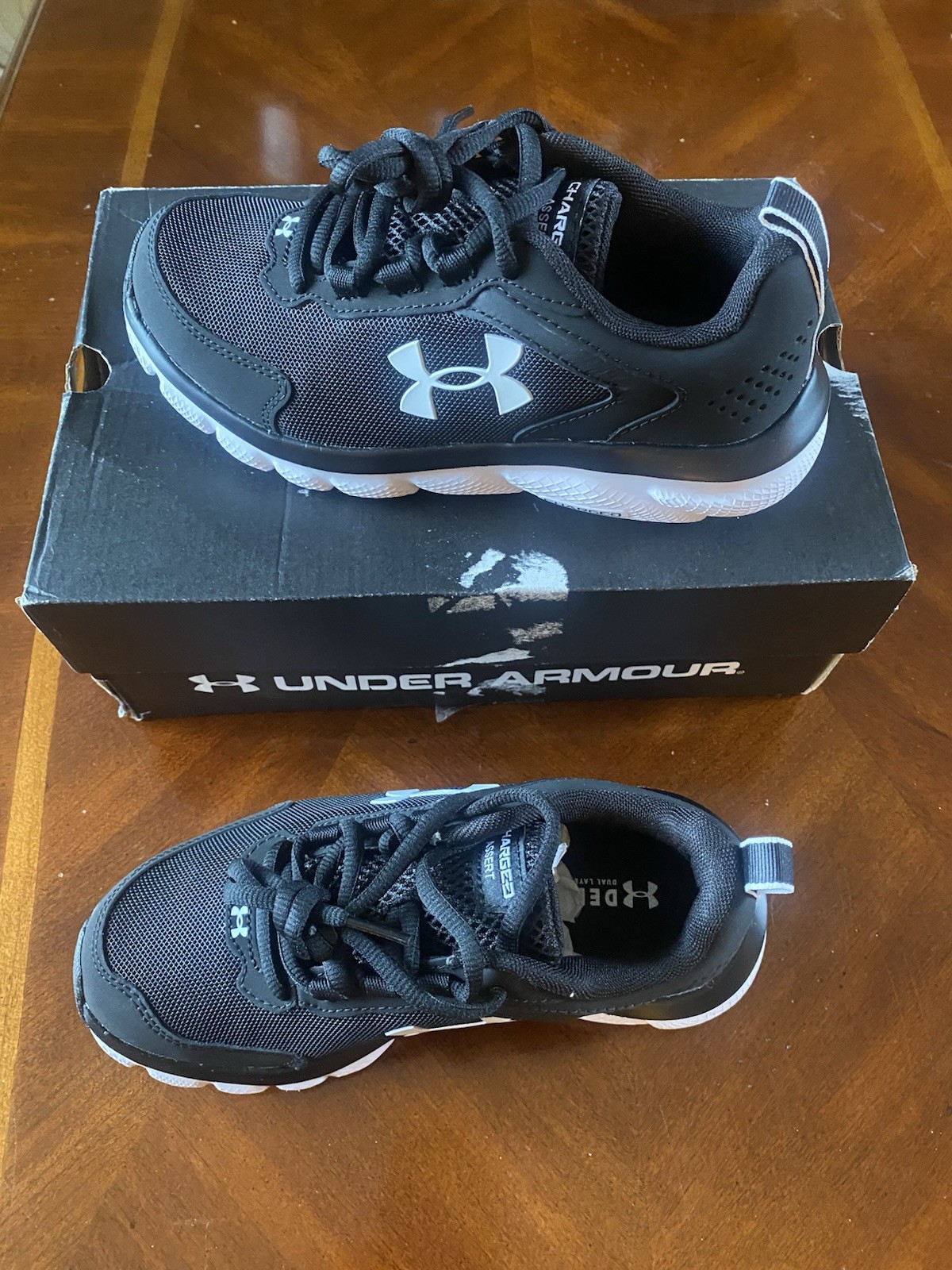Under Armour Charged Assert 9D Low Top Lace-Up Athletic Sneakers Black/White