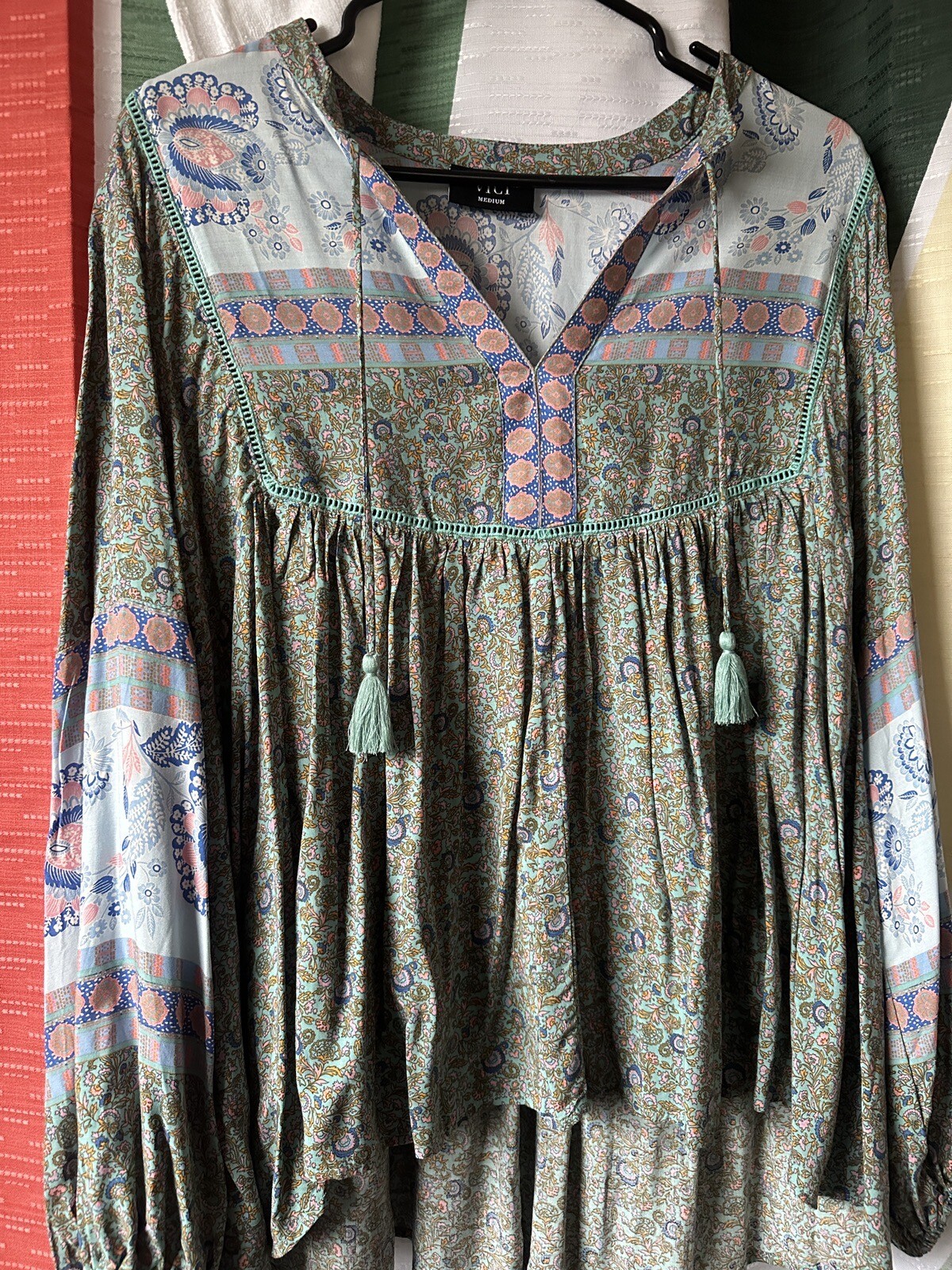 VICI Collection Blouse- Deep Water Floral Tassel Top New Without Tags