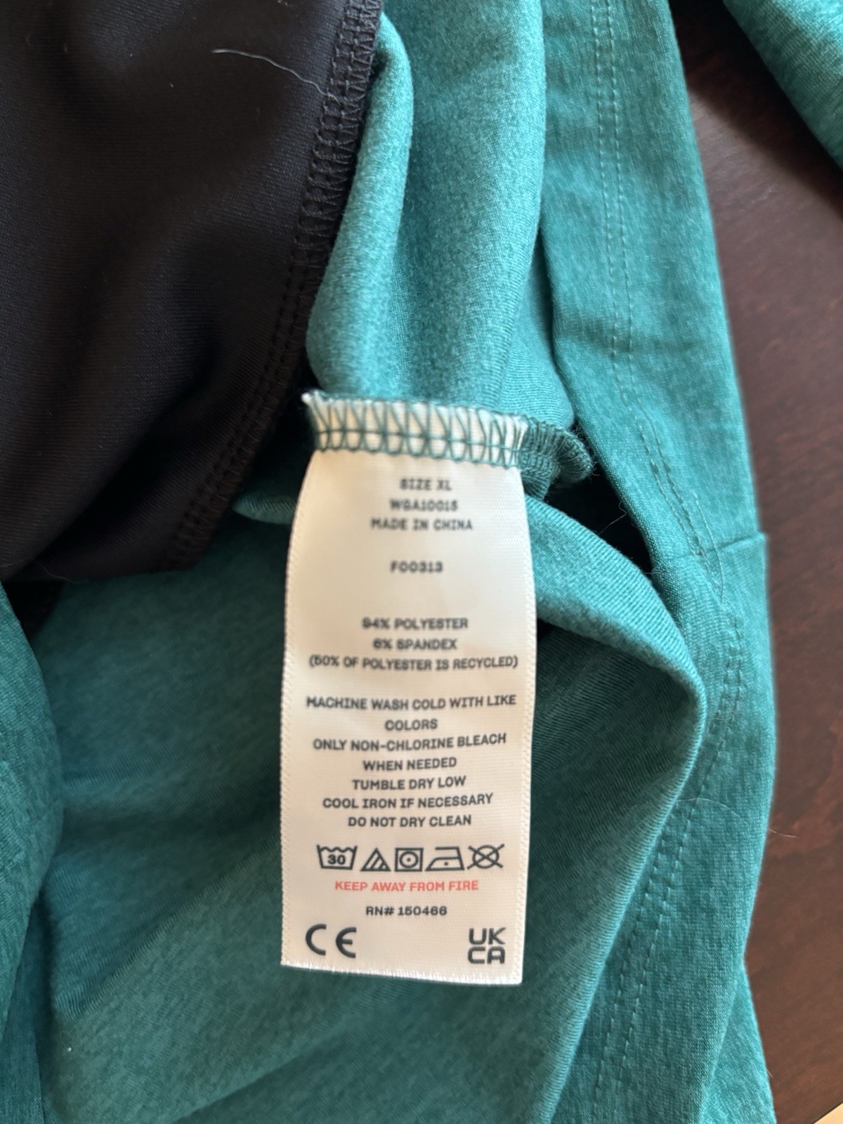 We Wander Women’s Long Sleeve Teal Exercise Top With Front Pockets Size XL